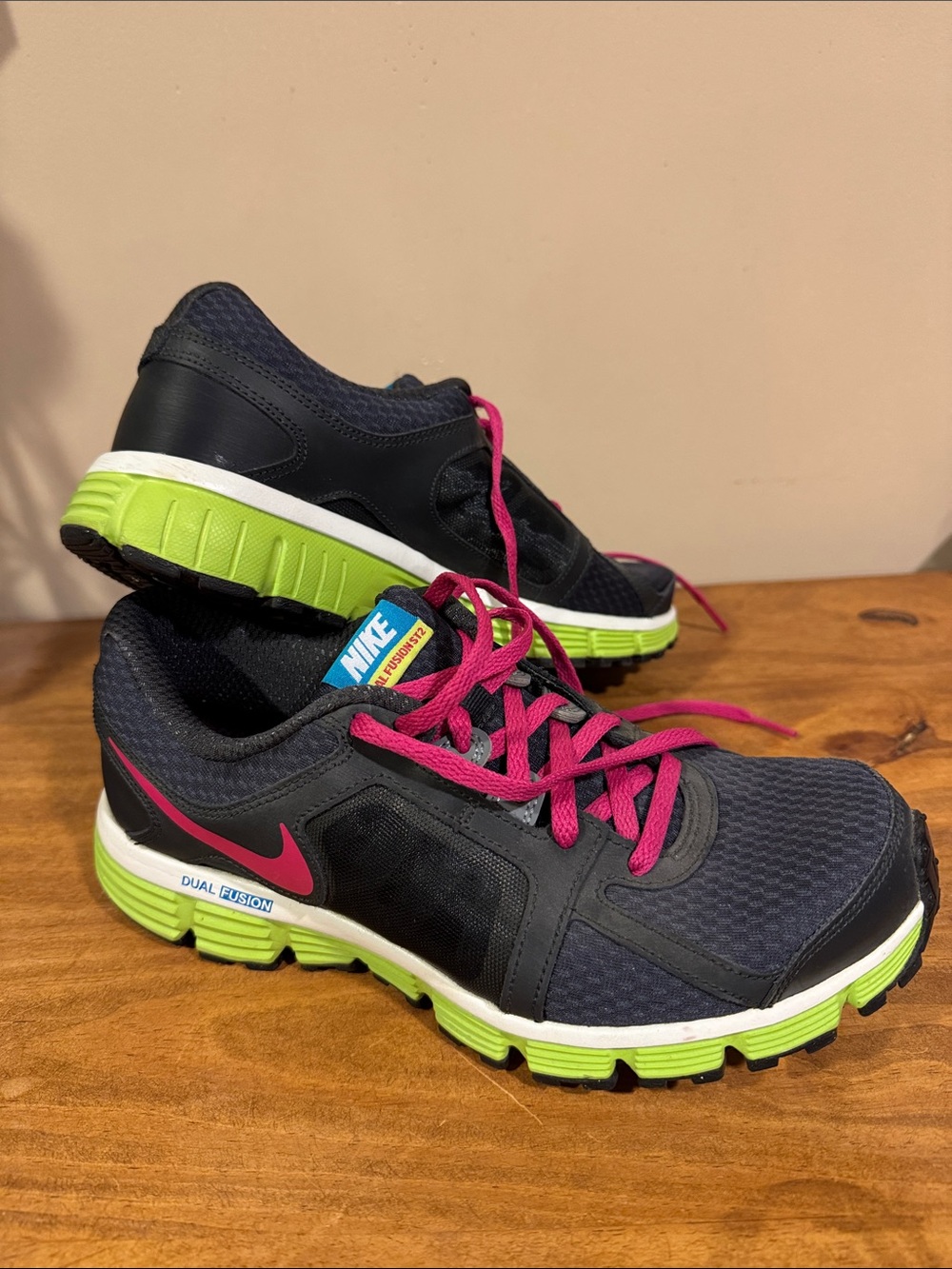Nike Navy Athletic Shoes with Neon Green Soles and Pink Accents